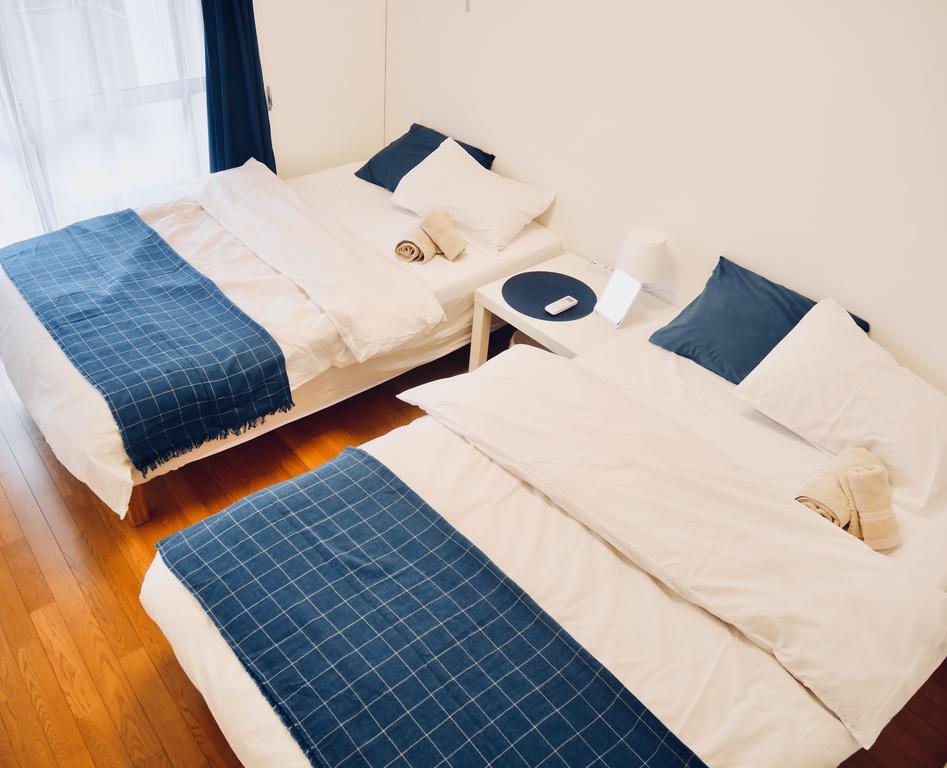 Izumi Apartment Осака Экстерьер фото